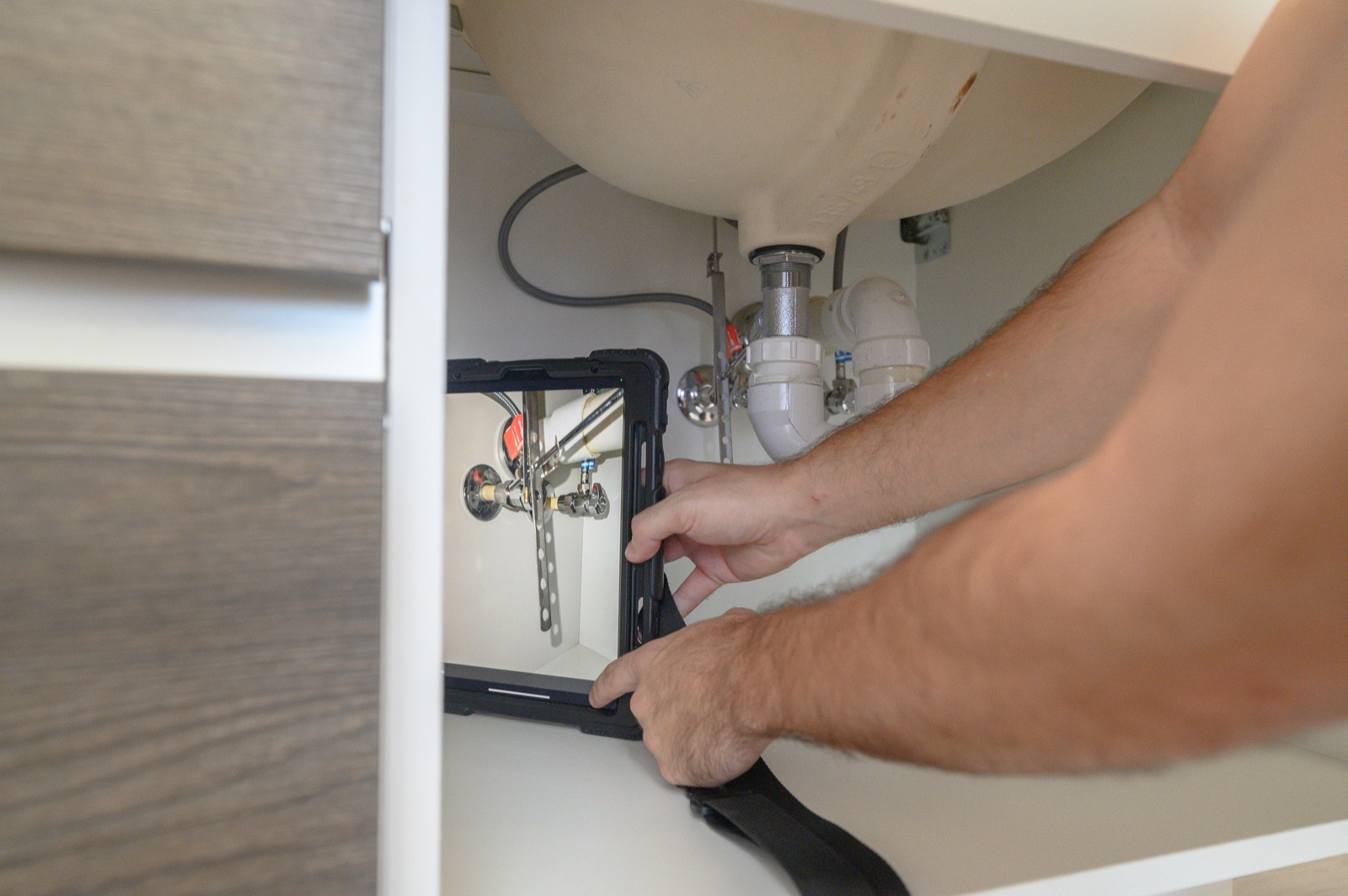 Home inspector documenting a 4-point inspection of a Miami property's roof, electrical, plumbing, and HVAC systems